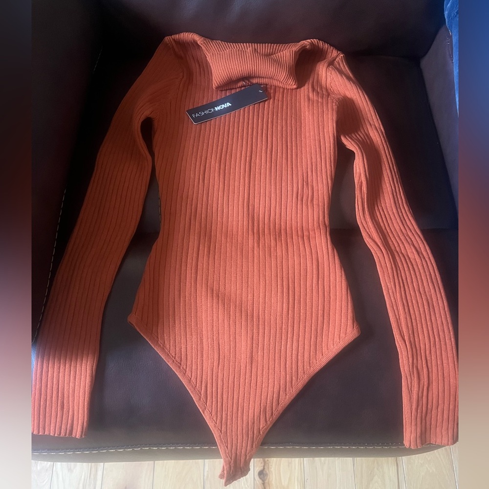 Rust color ribbed turtleneck bodysuit